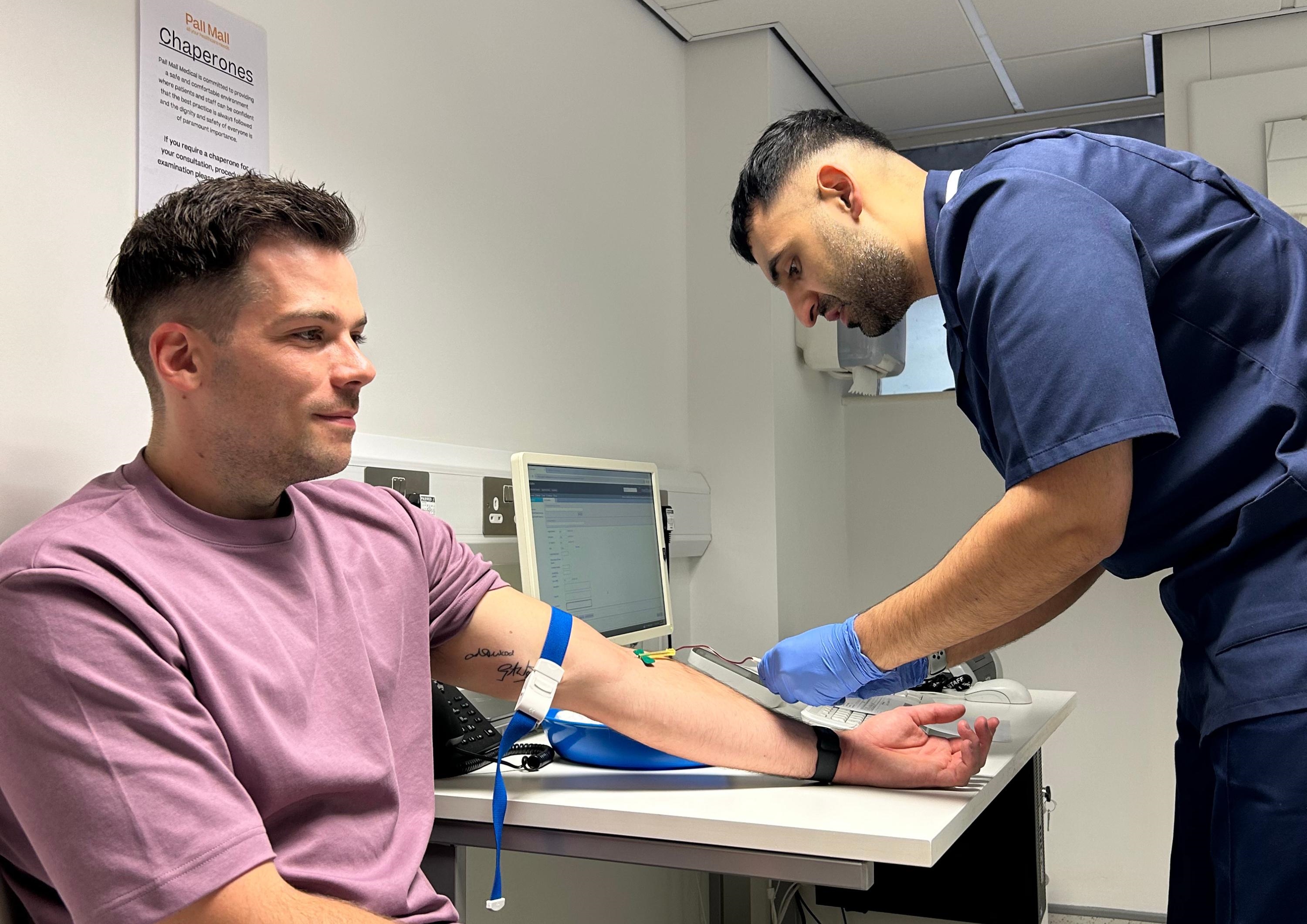 man getting a blood test man getting a blood test